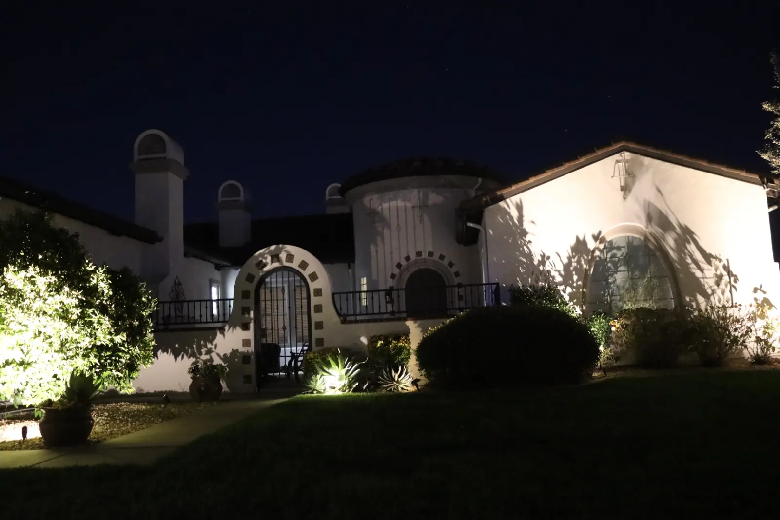 Two-story home before permanent roofline lighting