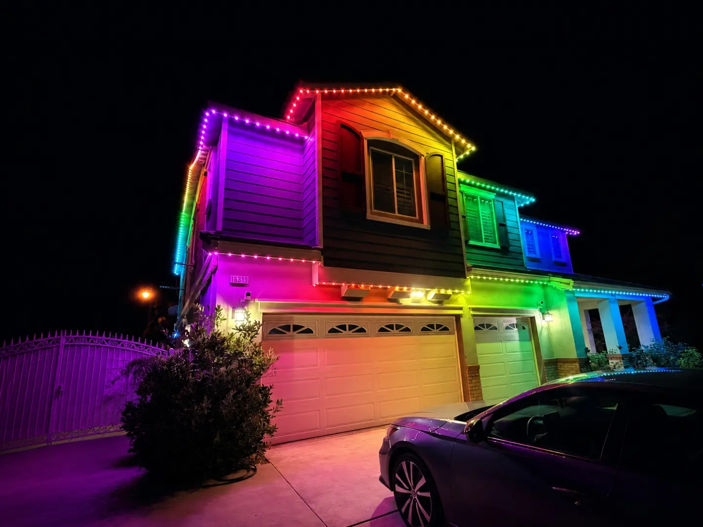 Permanent lighting displaying a festive multicolor scene