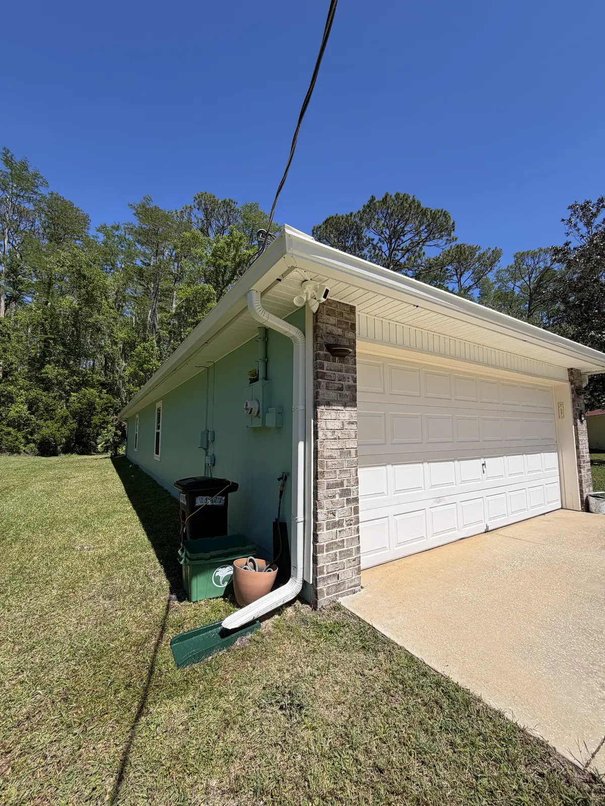 Bright clean garage exterior after professional washing