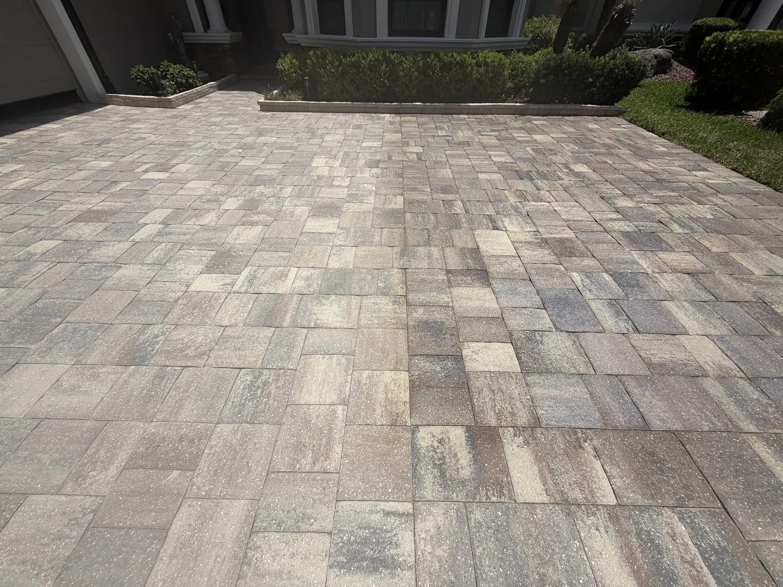 Close-up of cleaned residential driveway pavers