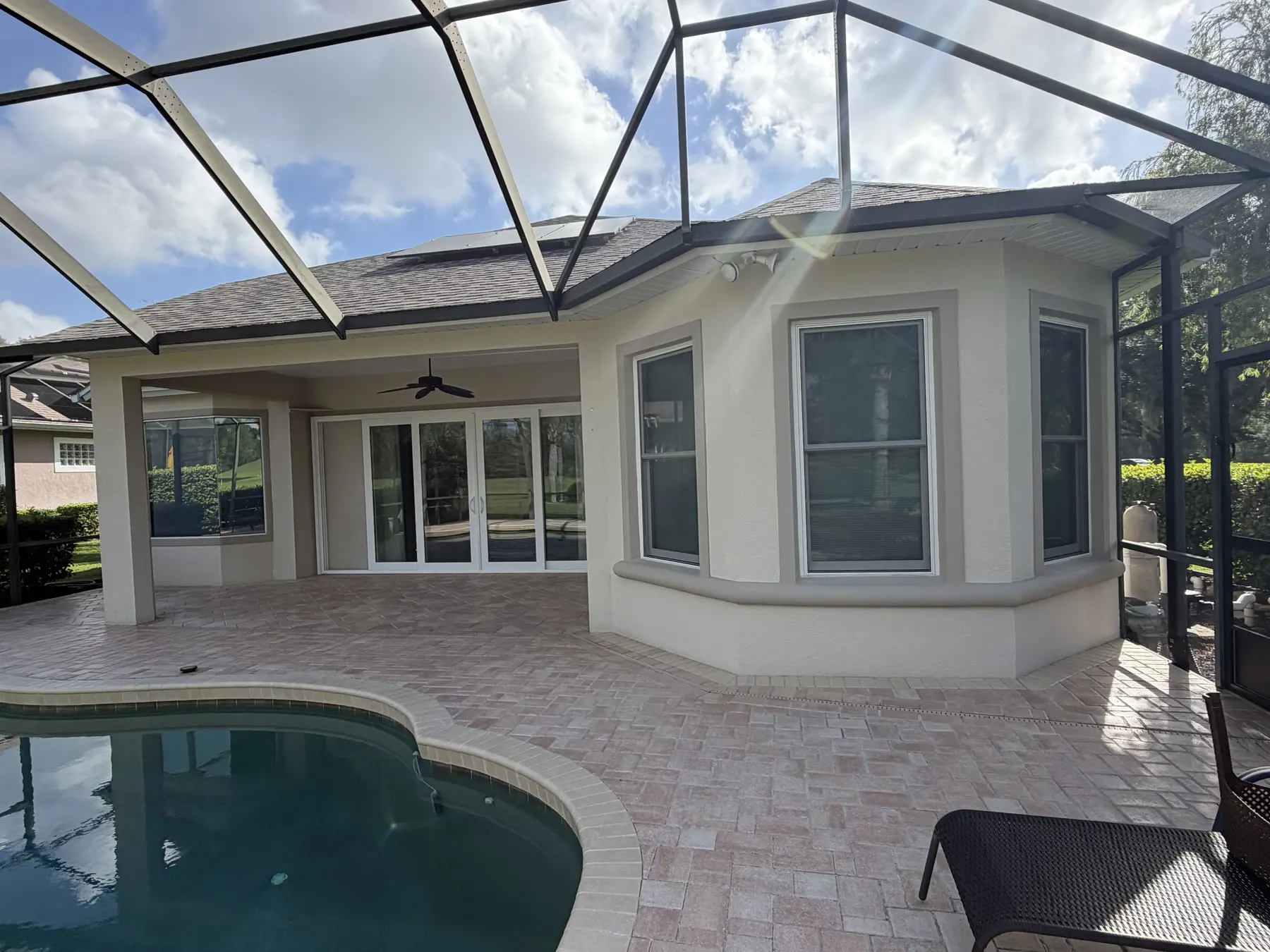 Restored pool deck at a Florida property after professional cleaning